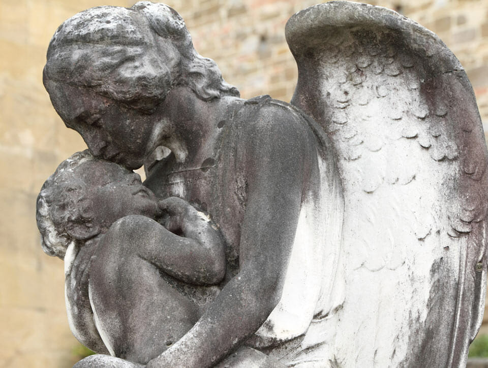 angel holding child